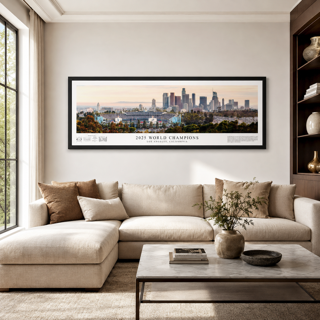 2025 Dodgers World Champions panoramic print displayed above a sofa in a collector living room